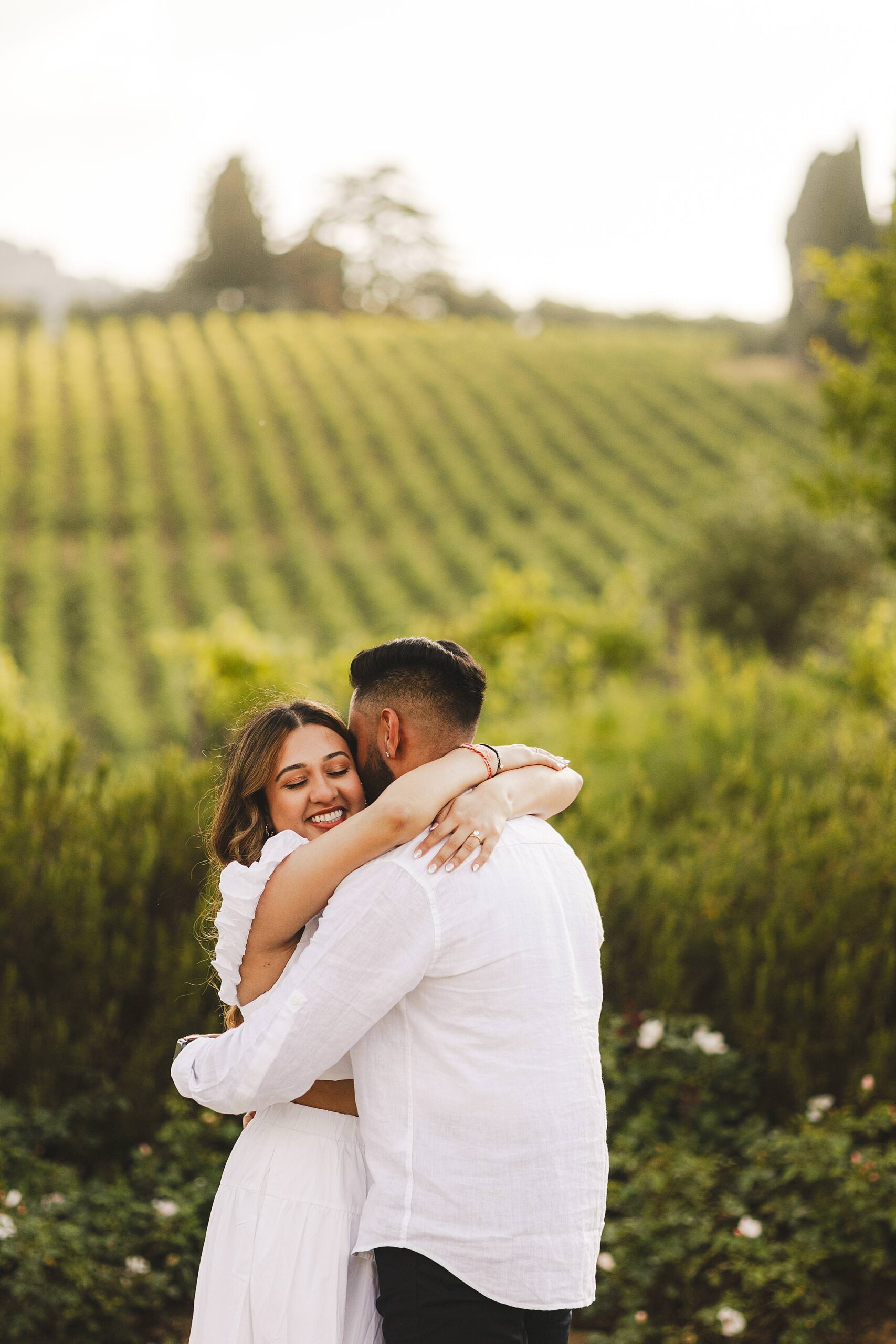 Exciting and fun engagement photo session in the heart of Chianti countryside at Borgo del Cabreo