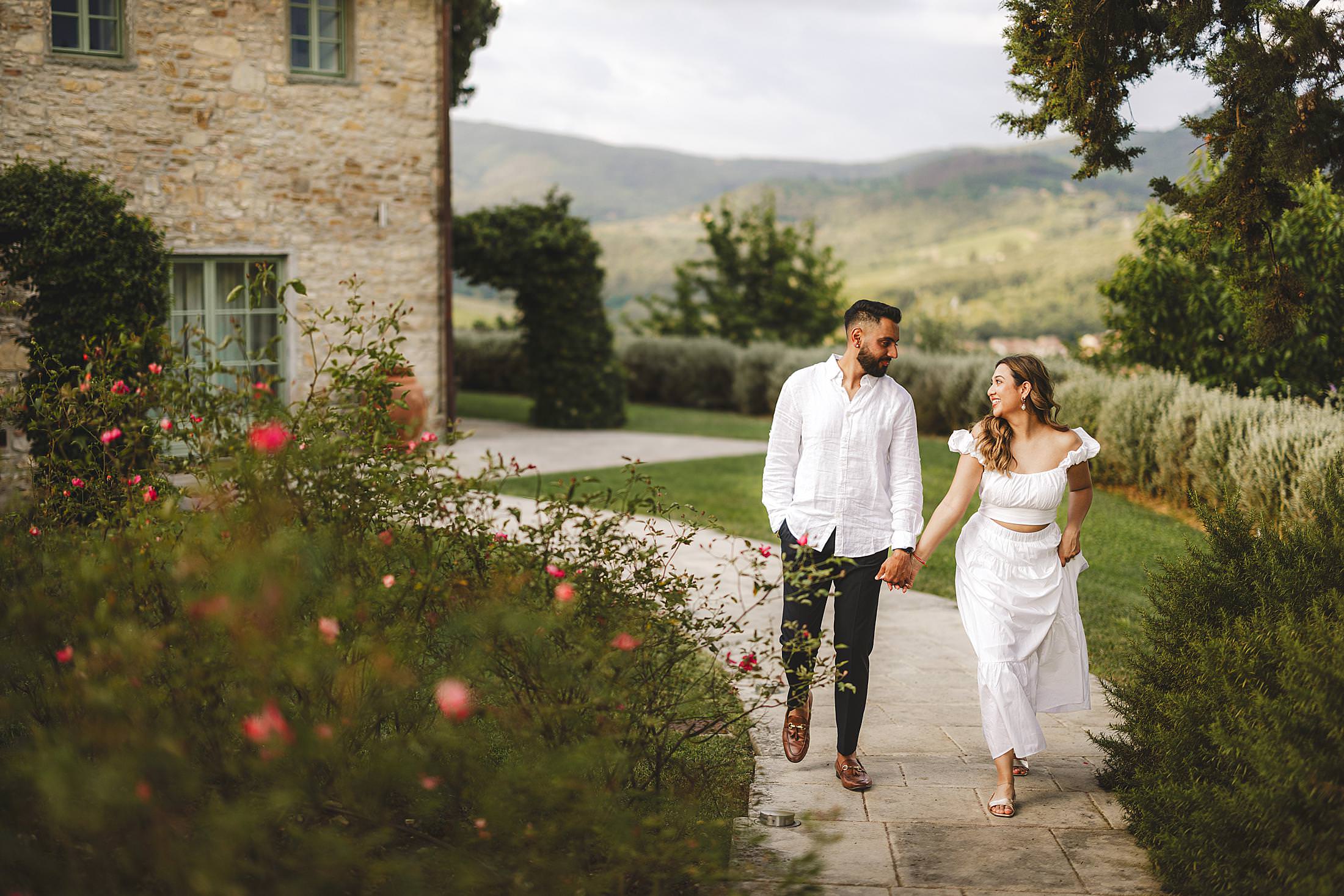 Elegant candid engagement photography in the heart of Tuscany in the Chianti at relais Borgo del Cabreo