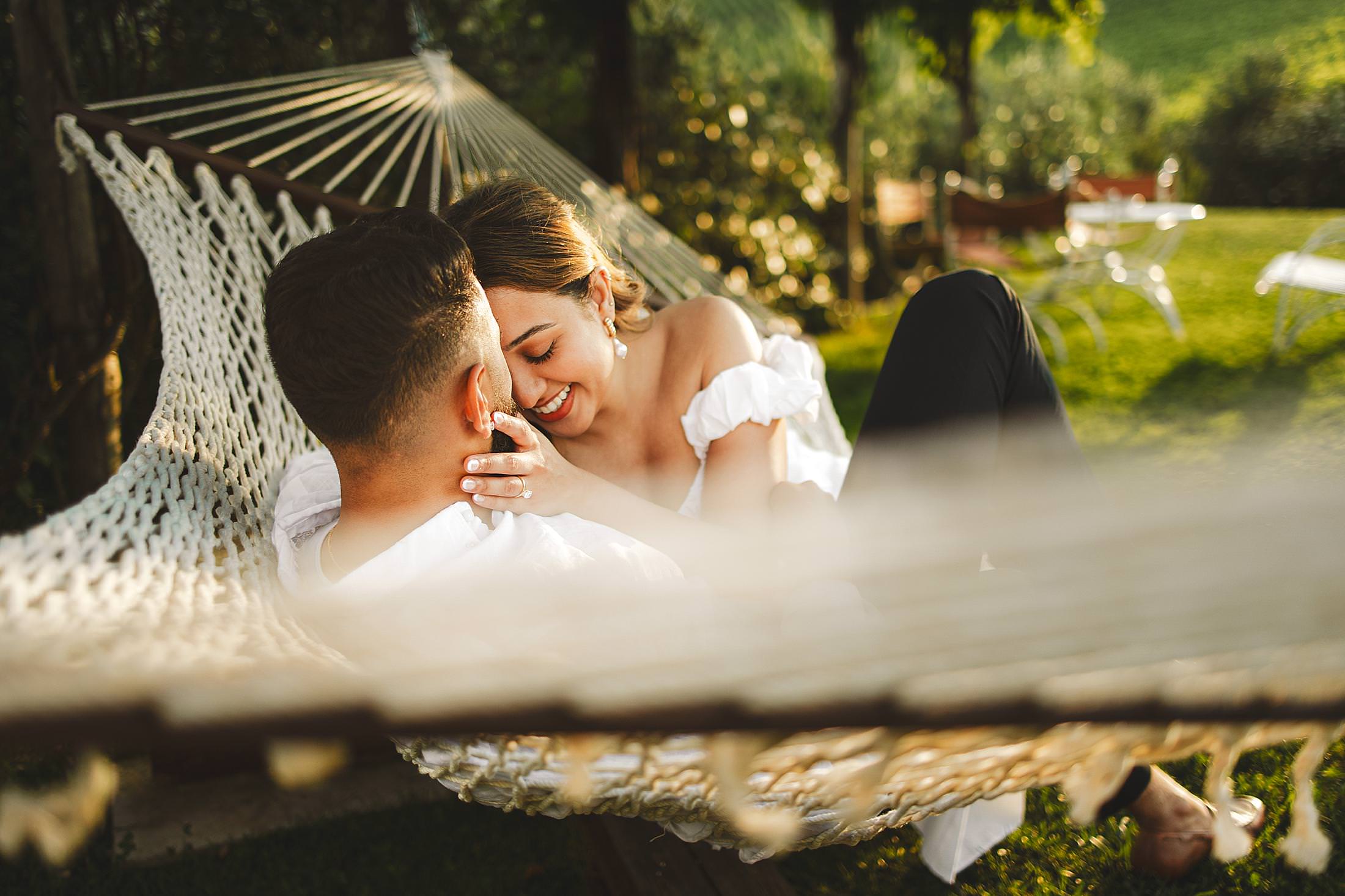 Elegant and classic wedding secret proposal in Chianti countryside at Borgo del Cabreo during golden hour