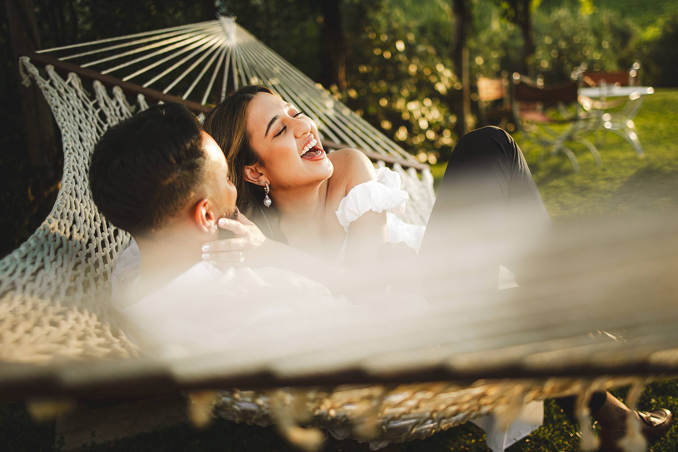 Memorable joyful and spontaneous couple engagement photo shoot in the heart of Tuscany at Borgo del Cabreo